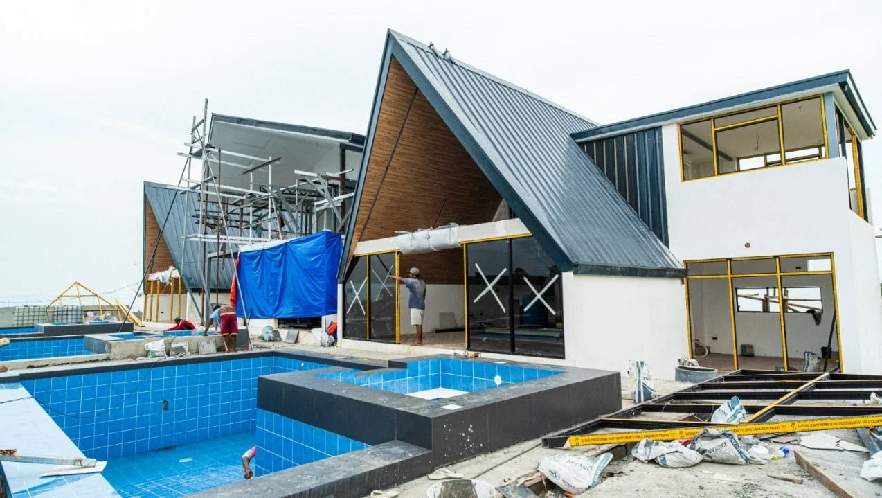 A City on a Hill A-frame villa and its pool during construction in 2024